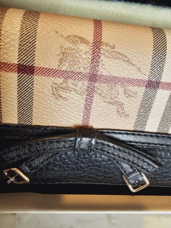 A close up of the inside of a burberry bag