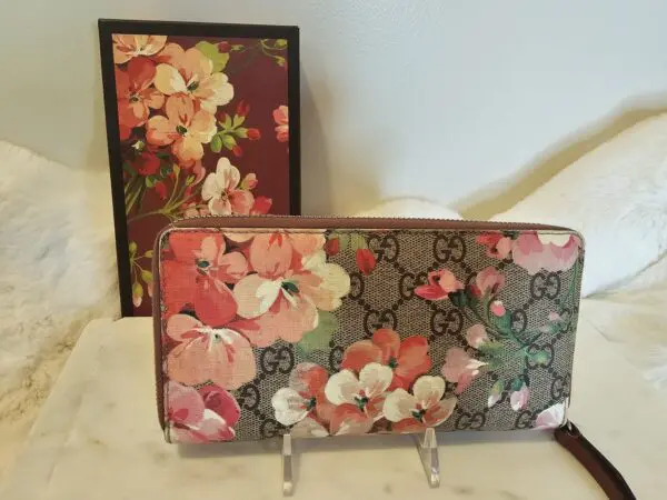 A pair of wallets with flowers on them