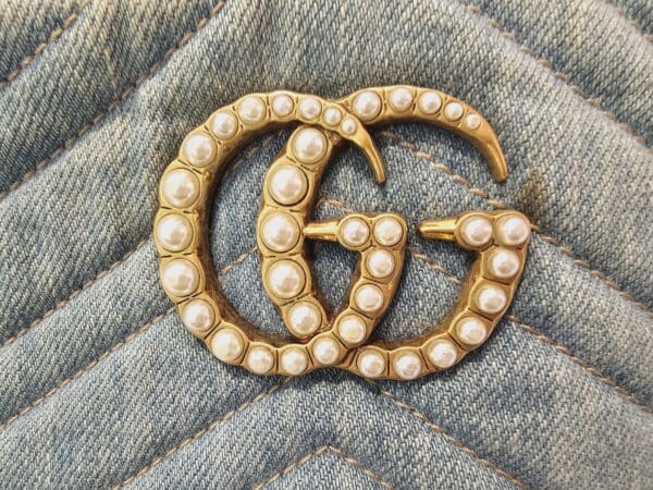 A close up of the g logo on a jacket