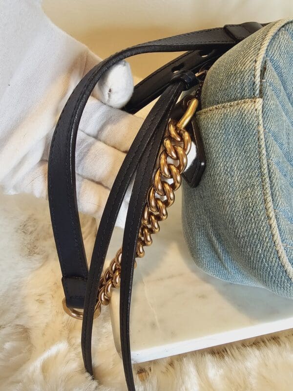 A close up of the strap on a bag