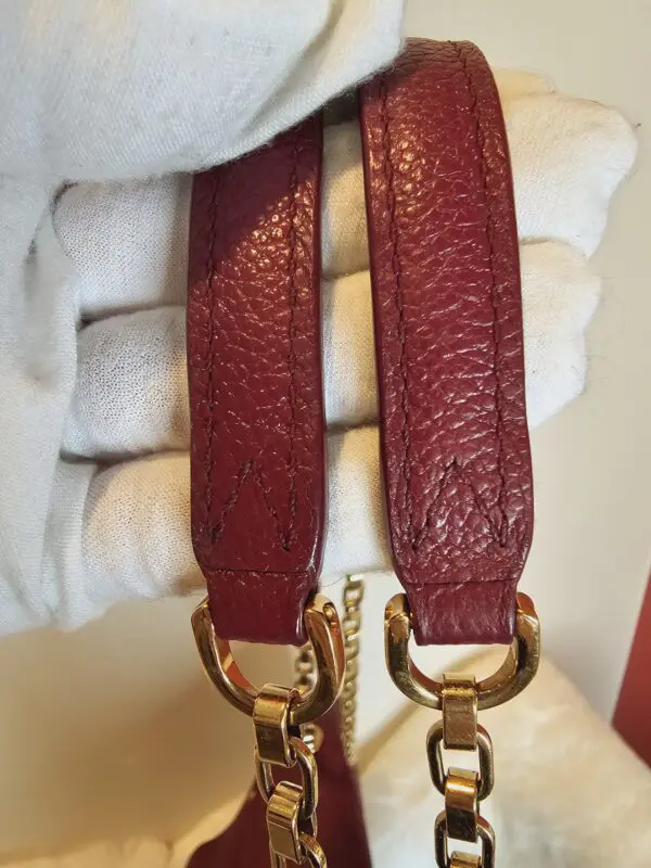 A close up of the strap on a bag