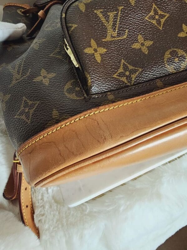 A close up of the inside of a louis vuitton bag