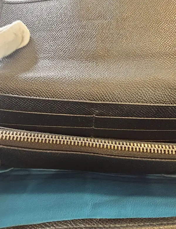 A close up of the inside of a purse