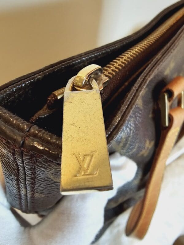 A close up of the inside of a louis vuitton bag