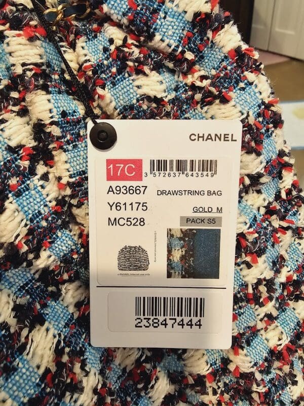 A close up of the tag on a chanel bag