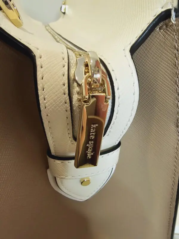 A close up of the strap on the shoe